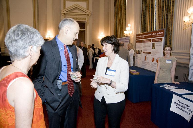 Connie Kasari speaking with Alan Guttmacher and Peggy McCardle