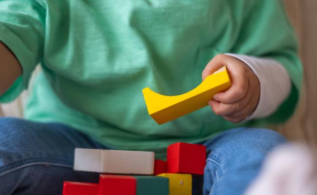 Child with Building Blocks