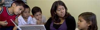 Teacher reading with kids